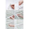 תאי אחסון מחולקים למקרר לשמירה על סדר וארגון